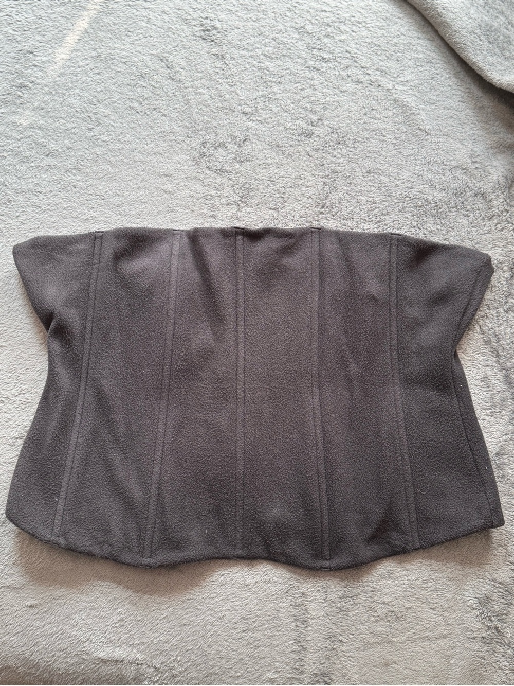 SKIMS Fleece Corset in the black/onyx colorway limited release